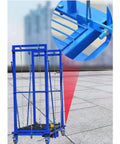 Tough As Nails Electric Lifting Table With Remote Control Heavy Duty Work Platform for indoor outdoor use with blue frame and swivel wheels.