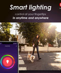 Woman walking dog while controlling Smart Candelabra LED Bulb 40W Equivalent, WiFi Enabled, with smartphone app displayed.