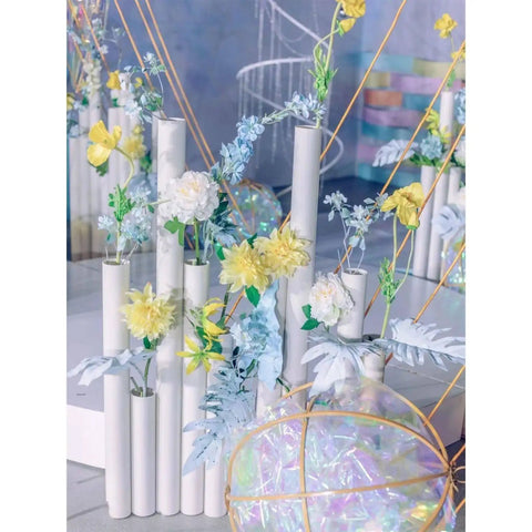 Four Heavy Duty White Schedule 40 Pvc Pipes 1.5 Inch Diameter By 17 Inch Length Top Shelf Pvc Tubing in floral arrangement.