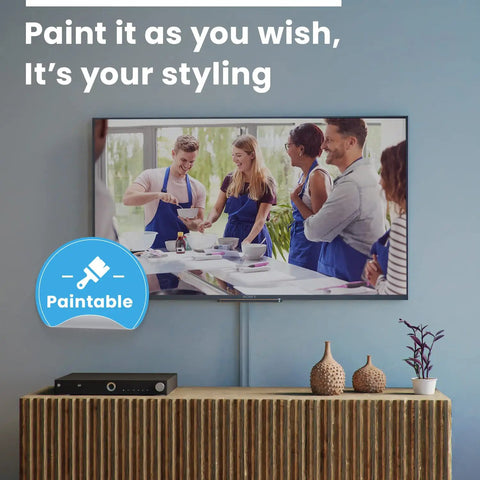 TV Cord Hider Kit 34 Inch White Peel And Stick Cable Concealer under wall mounted TV with decorative items in living room