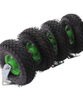 10 Inch Heavy Duty Pneumatic Caster Wheels 4 Pack Swivel Locking Rubber Inflatable Tires mounted on a base for industrial use.