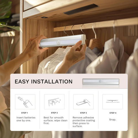 Person installing 6 Pack Motion Sensor Lights For Closets And Stairs, 10 LED Battery Operated Night Lights in wardrobe