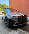 BMW iX with BMW Roof Rack Cross Bars For iX 2020 And Up No Drilling Aluminum T Slot Design Lockable 330 Lbs Load Capacity
