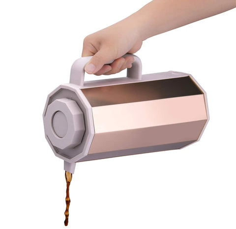 Hand pouring coffee from Gold Glass Vacuum Carafe 1.0 Liter Insulated Bottle With Premium Borosilicate Glass Liner