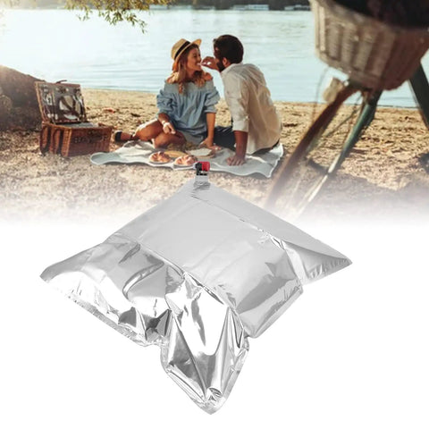 5 Pack Foldable Water Storage Bags With Spigots For Camping And Adventure, 15L portable drinking water bladder with picnic in background.