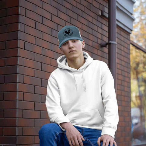 Man wearing a white hoodie and Sky Blue Adjustable Trucker Cap For Women, Washed Cotton Dad Hat With Breathable Comfort, Lightweight Summer Hat.