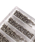 Top Shelf Stainless Steel Watch Repair Tool Kit Features One Thousand Micro Eyeglass And Clock Back Screws organized in a clear case.