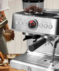 Real Deal Home Espresso Maker With Built In Grinder And Silky Milk Frother, 20 Bar Pressure For Rich Shots, 95 Oz Tank For Chill Latte Nights, Quick Rinse Silver Body, Consistent Daily Grind, with coffee being poured into a glass.