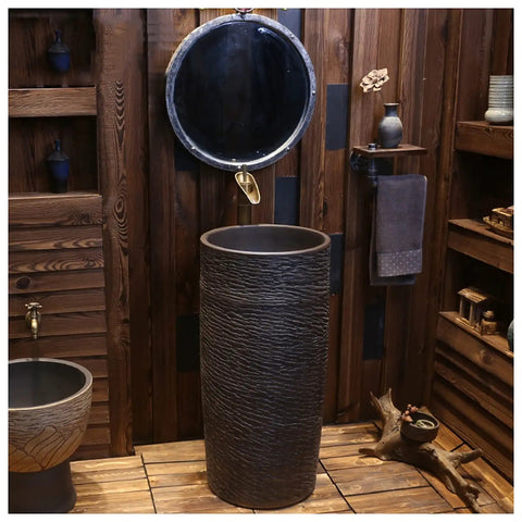Heavy Duty Ceramic Pedestal Bathroom Sink And Vessel Combo Includes Faucet Drain And Handy Shelf Space Built Tough For Indoor Outdoor Use With Easy Peasy Plumbing Install in rustic bathroom setting.