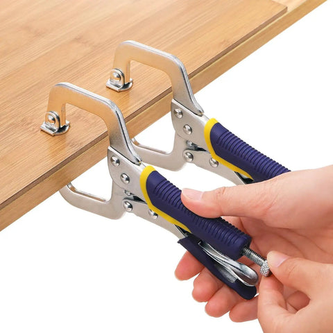 Four Pack 6.6 Inch Metal Face Clamps With Swivel Pad Heavy Duty And Rubber Handles Adjustable C Clamps Vise Grip in use on wood