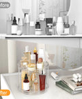 Rotating Makeup Organizer With Two Tier Lazy Susan Turntable For Vanity And Bathroom Counter, clear with cosmetics displayed