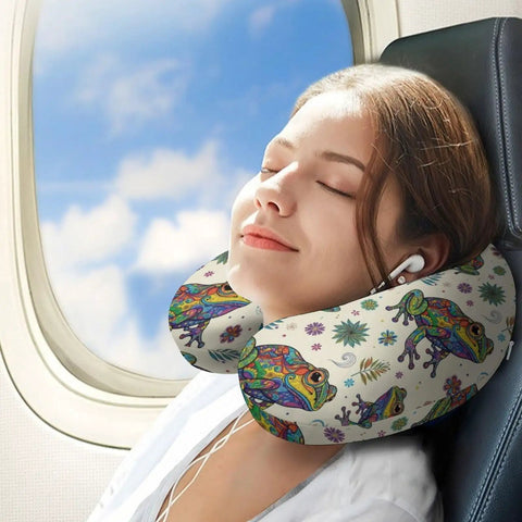 Woman using Ultra Cozy U Shaped Neck Pillow For Travel And Office Use Lightweight Reusable Polyester Napping Pillow With Abstract Frog Print