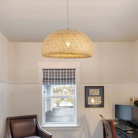 Roomy Bamboo Plug In Pendant Light With Dimmable Switch And 14 Foot Handmade Woven Cord hanging in a cozy room above a desk.