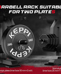 Close-up of barbell rack on Beefy 1200 Pound Capacity Weight Bench With Leg Extension And Curl, holding two Olympic weight plates.