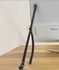 Two Pack Adjustable TV Safety Straps No Drill Adhesive Anti Tip Furniture Anchors securing monitor to desk