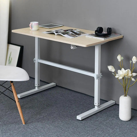 Built Different Crank Adjustable Height Standing Desk with sweet white maple top, 120 by 60 cm, suitable for office space.