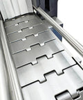 Heavy Duty Steam Bottle Sleeve Label Shrinking Machine With 5.6FT Heat Tunnel And 24KW Generator conveying plastic labels on stainless steel surface.