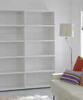 Room with white bookshelves enhanced by Glossy White Self Adhesive Film Roll 17 Inches By 78 Inches For DIY Home Makeovers Peel And Stick Wallpaper.