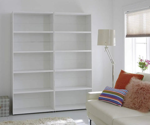 Room with white bookshelves enhanced by Glossy White Self Adhesive Film Roll 17 Inches By 78 Inches For DIY Home Makeovers Peel And Stick Wallpaper.