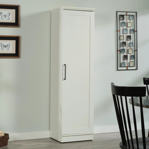 Slim Pantry Cabinet With Adjustable Shelves in soft white, single door for easy organization, against wall in modern home setting