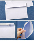 100 Pack White Privacy Pattern Envelopes Self Sealing Mailers for Secure Document Mailing and Small Biz Packaging with flap open