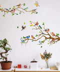 Hummingbird On Tree Branch Wall Sticker Set With Green Leaf And Flying Bird DIY Vinyl Wall Decal, Self Adhesive PVC Art Decor displayed in living room.