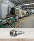 Smooth As Silk ISO20 ER20 Collet Chuck CNC Tool Holder Adapter Built Different For G2.0 on a workshop table with CNC machines.