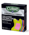 Tough As Nails Antibacterial Bandages For Elbows And Knees 3X3 Inch packaging showing 10 bandages with colorful designs.