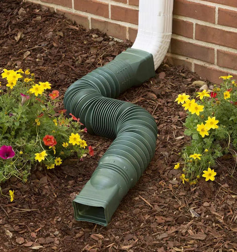 Extendable Downspout Extension Green For 2x3 And 3x4 Downspouts Durable And Easy To Install in garden setting.