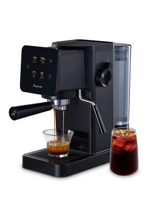 Badass Home Espresso Maker With Slick Touchscreen Interface And 20 Bar Pump Pulls Knockout Shots For Smooth Lattes Or Quick Cold Brew Featuring Full Milk Frothing Setup With Generous 41oz Water Tank, brewing espresso with a glass below.