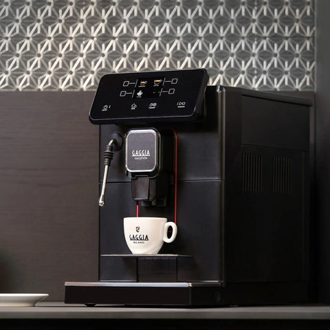 Super Automatic Espresso Machine With One Touch Brewing And On The Fly Settings To Nail Your Favorite Cups Featuring A Bright Color Screen brewing espresso in a white cup.
