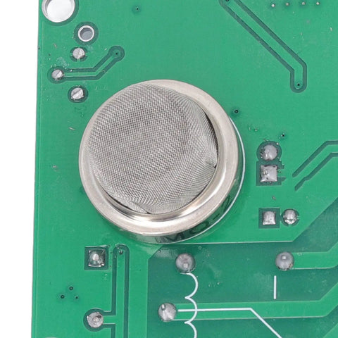 Close-up view of MQ2 smoke sensor mesh on circuit board, part of Top Shelf MQ2 Smoke Detector Module With Loud Buzzer Alert And Proven Relay Switch, Reverse Connection Guard For Kitchens And Hotels, No Sweat Plug And Play DC Setup.