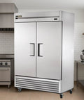 Top Shelf Two Door Reach In Freezer Built Tough With Smooth Stainless Finish And No Nonsense Self Sealing Doors Perfect For Busy Commercial Kitchen Cold Storage Tasks in a kitchen.