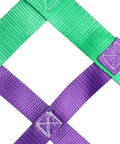 Heavy Duty Nylon Cargo Lift Net Rock Solid Sling Rig For Flatbed Hauling And Construction Sites with green and purple straps.
