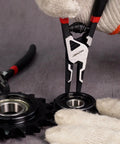 Pro-Grade 4-Piece High Leverage Snap Ring Pliers Set used to install circlip on a bearing. Chrome vanadium steel, rust-resistant.