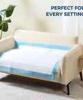 Ultra Thick, Super Absorbent Disposable Bed Pads 30x36 Inches for Adults, Seniors, and Pets on a couch.