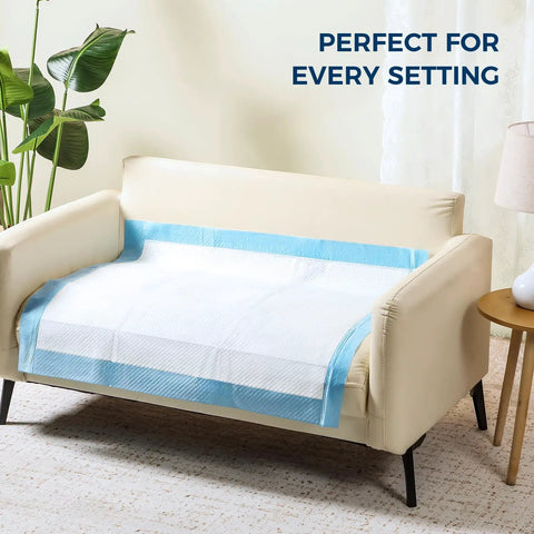 Ultra Thick, Super Absorbent Disposable Bed Pads 30x36 Inches for Adults, Seniors, and Pets on a couch.