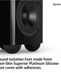 Close-up of subwoofer on Eight Pack 2.5 Inch Platinum Silicone Speaker Isolation Pads With Adhesive Non Skid Anti Vibration Mounts 20 Duro Black.