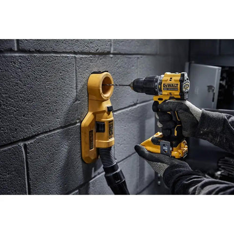 Compact 20V Max Brushless Cordless Hammer Drill With A Rock Solid Ratcheting One Half Inch Chuck And One Thousand Six Hundred Fifty RPM For Tight Spots And Knuckle Bash Work Ready To Roll Tool Only Edition drilling into a masonry wall.