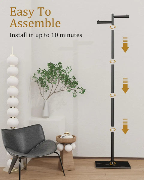 Freestanding Metal Coat Rack With Z Shaped Design, 175cm Tall Black Garment Tree On Heavy Rock Base in modern room