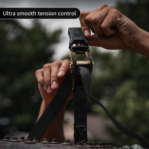 Close-up of hands using Beefy Heavy Duty Ratchet Tie Down Straps 1 Inch By 15 Feet Pack Of 4 With 1823 Lbs Break Strength Black.