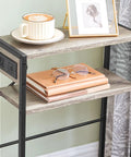 Slim Narrow Side Table With Charging Station And USB Ports Type C Space Saver For Small Spaces Sofa Beside Table With Storage Shelf In Greige And Black Compact Nightstand For Bedside Or Living Room with books and frame.