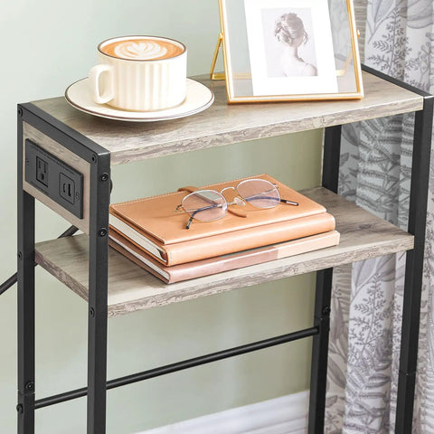 Slim Narrow Side Table With Charging Station And USB Ports Type C Space Saver For Small Spaces Sofa Beside Table With Storage Shelf In Greige And Black Compact Nightstand For Bedside Or Living Room with books and frame.