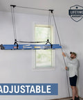 Man using Heavy Duty Ladder Ceiling Storage Hoist With Adjustable Straps Overhead Pulley Rack For Garage And Home Hi Lift Organizer Pro