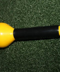 Close-up of True Flex Swing Tempo Trainer For Golfers Helps Flatten Your Swing Plane, Sharpen Tempo, yellow polyurethane head.