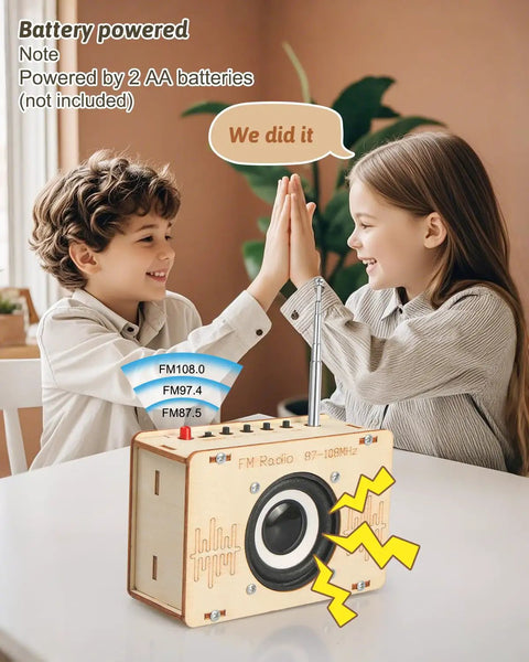 Children celebrating with completed Hands On FM Radio Kit for Kids and Teens STEM Electronic DIY Experiment Kit on table.