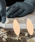 Pro Grade Hardwood Biscuit Joiner Kit With Precision Slotting Jigs And Matched Wooden Dowels for assembly on wood.