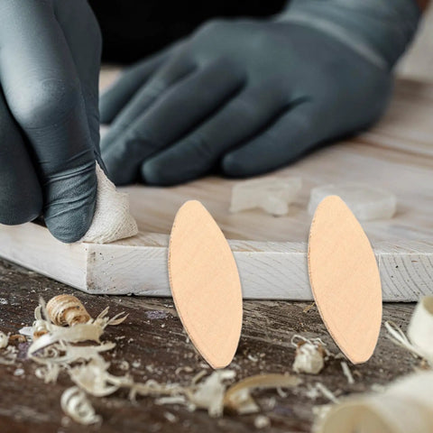 Pro Grade Hardwood Biscuit Joiner Kit With Precision Slotting Jigs And Matched Wooden Dowels for assembly on wood.