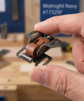 Close-up of 10 Pack Heavy Duty Roller Catch Cabinet Door Latch Set With Spring Loaded Mechanism in hand, ancient red