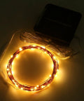 Coiled Solar String Lights 16 Feet 50 LEDs Warm White Two Pack Outdoor Fairy Lights glowing in the dark